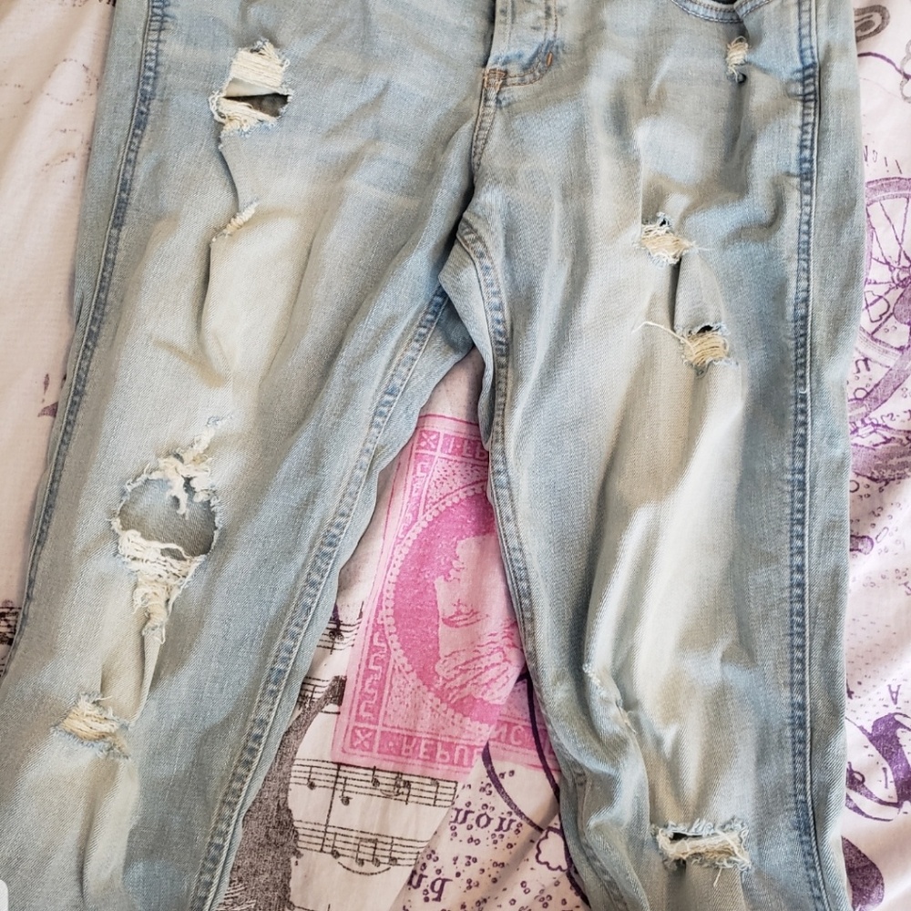A pair of Hollister light blue ripped jeans